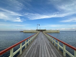Historic wooden pier leading to the Ribersborg open-air bathhouse, Malmo, Skåne, Sweden, August 2023