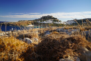 Lindos bay is full of boats and yatchs