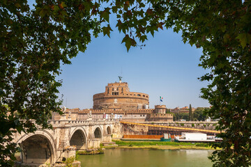 Castel Sant'Angelo Framed by Lush Trees Along the Tiber River in Rome