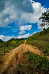 Adventurous hike on a dusty trail scenic hills photography nature wide angle journey of exploration