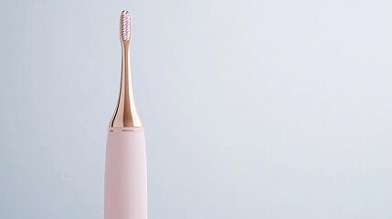 Naklejka premium Modern Electric Toothbrush on a Minimalist Gray Background