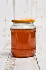 Large jar of golden honey