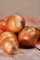 White onions on a wooden board