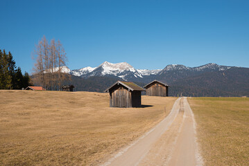 hiking way through hilly landscape Buckelwiesen, with mountain view, upper bavaria