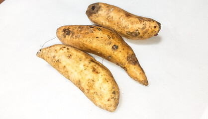 potatoes on wooden board