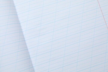 Copybook paper sheets as background, top view. School stationery