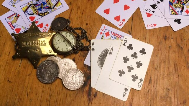Dead man's hand . Aces and two Eights, named after Wild Bill Hickok who was killed with it in 1876