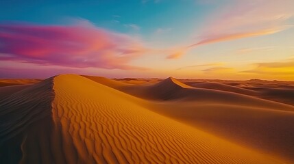 Abstract sand dunes with smooth gradients under a colorful sunset sky