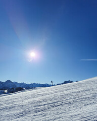 winter landscape with snow covered mountains on European Alps ski resort