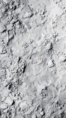 Fototapeta premium A textured surface resembling dry, cracked earth or sediment.