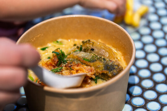 ramen soup takeout in brown cardboard takeaway bowl