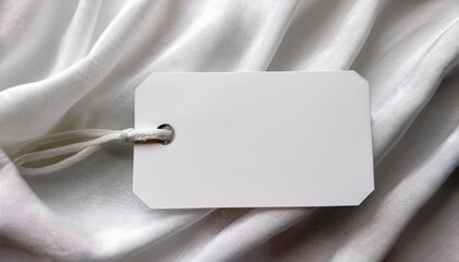 Close-up of a plain white tag on white fabric