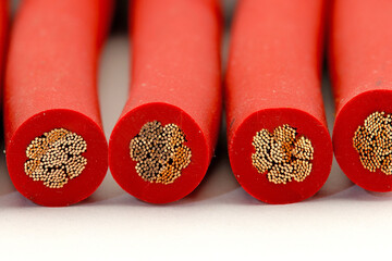 Copper electrical installation wires in colored insulation. Close-up. Soft focus.
