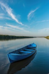 Obraz premium Serene Monochromatic Blue Boat on Calm Volga River Waters