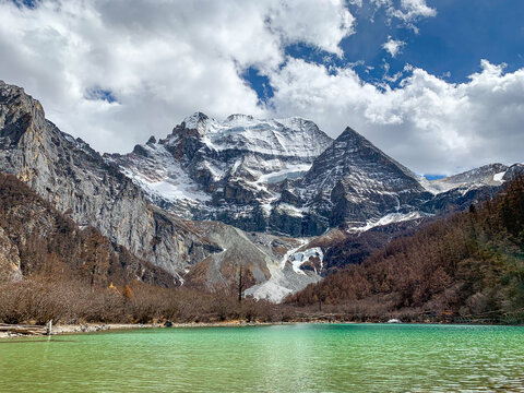 Magnificent Emerald green water at Pearl Lake or Zhuoma la or Zhuomalacuo lake in the Yading Nature Reserve, Sichuan, China 