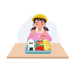 japanese kindergarten girl in school uniform eating obento lunch box with a smile