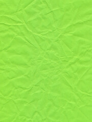 Surface of colored paper, sheet of crumpled light green paper