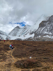 Hiking in one of the most beautiful  Chinese national parks, Five A tourist attractions, Yading Nature Reserve, Sichuan Province, China