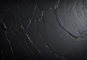 Dark slate stone is a deep, rich material with a cool, almost mysterious allure. Its surface is smooth yet subtly textured, revealing fine layers that catch the light in delicate, muted reflections
