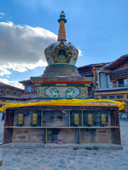 Shangri La old town, Dafo Tibetan Monastery with its giant golden prayer wheel 