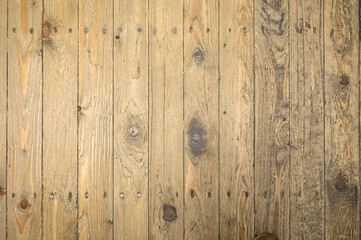 Fototapeta premium Textured background of vintage-style wooden boards with hammered nails and screws