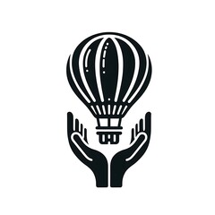 Obraz premium Hands holding a hot air balloon symbolizing support.