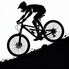 Fototapeta premium Silhouette of a mountain biker ascending a slope.