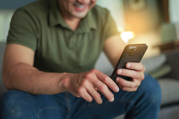 man using mobile phone holding cell phone texting message contact us.chatting,search internet shopping online.device communication connecting