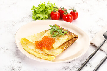 Russian pancake with red caviar