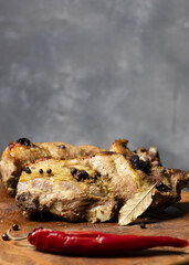 Baked meat on wooden board