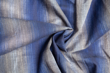 Fototapeta premium Gray blue fabric cloth texture with spiral folds