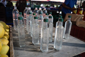 rakia bottles from the farmer's market of Rhodes , Greece