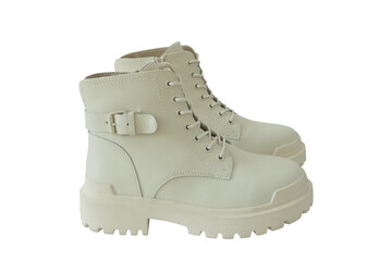Beige leather boots with laces on a white background. Side view. Isolated.
