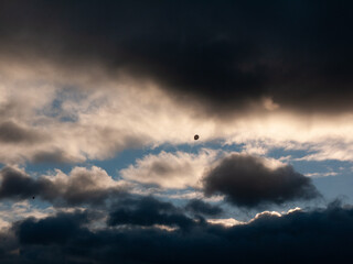 Black Child’s Balloon Escapes Into Stormy Sky