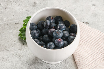 Sweet ripe blueberry on the bowl