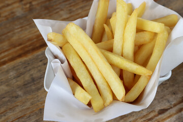 French Fries on Plate. Closeup view of french fries in a restaurant.Potato chip