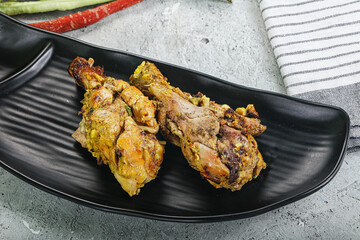 Chicken leg tikka with spices
