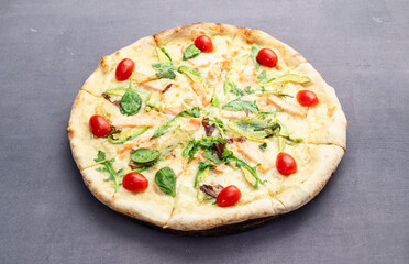 Italian pizza with avocado salmon  tomatoes and mozzarella photography. top view