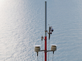  weather recording instruments in liguria against the sea