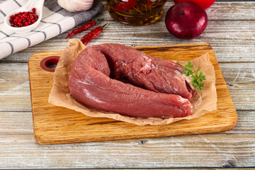 Raw pork tenderloin for cooking