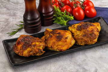 Roasted chicken thighs  with spices