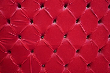 Close up of Luxury red velvet textured furniture surface