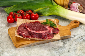 Raw beef cheeks cut for cooking