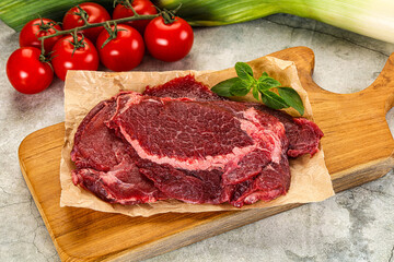Raw beef cheeks cut for cooking