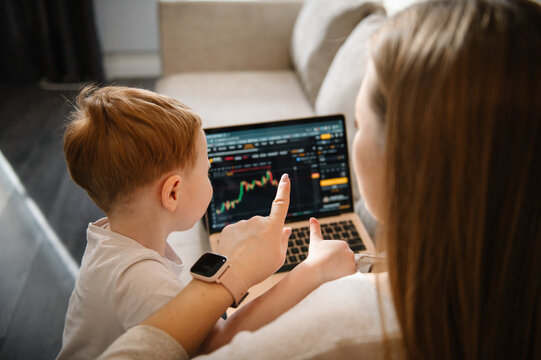 Selling ether, bitcoin or altcoin. Work cryptocurrency market chart on laptop monitor screen. Kid make noise and disturb woman working talking on phone. Mom work on laptop from home with child.