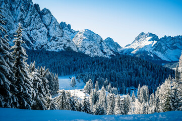 Ice Dawn in Sappada. Walk through ancient villages and dream mountains. Dolomites.