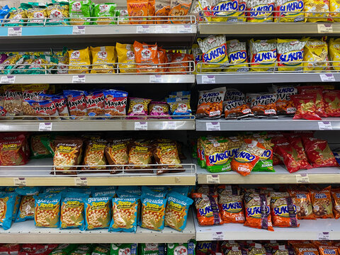 Various peanut snack brands at Indonesia, displayed on supermarket shelf, in November 11th 2023 on Semarang, Indonesia