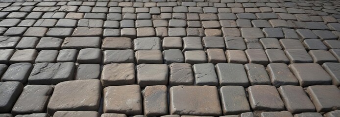 Ancient cobblestone floor with worn stones and cracks, ancient, cracks
