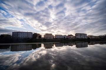 Ferrara waterway and navigable canal in Ferrara at sunset