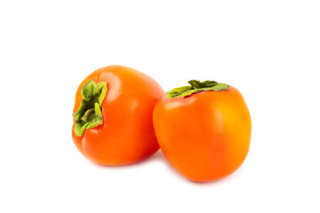 Persimmon isolated on white background. Persimmon fruit. Slice of ripe, juicy, sweet persimmon fruit. Vegan. Fruit garden. Close-up.